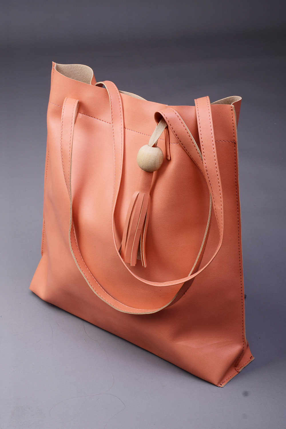 Peach Handbag with beautiful Tassel